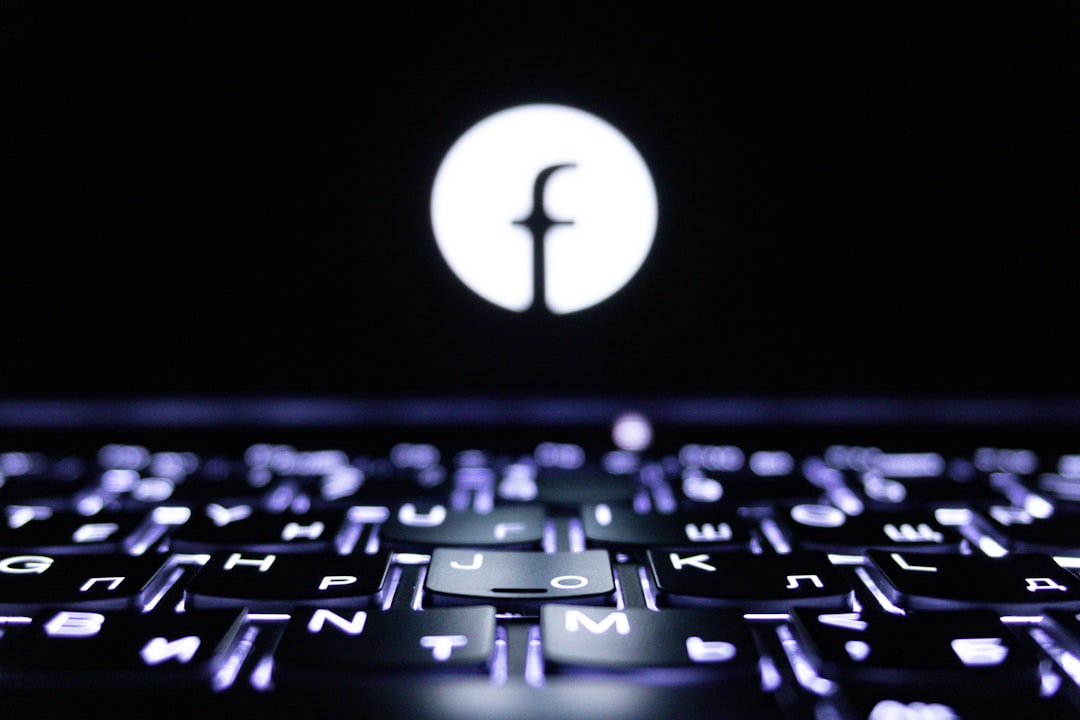 facebook-logo-illuminated-on-a-dark-screen-over-keyboard-3l24v8u293q